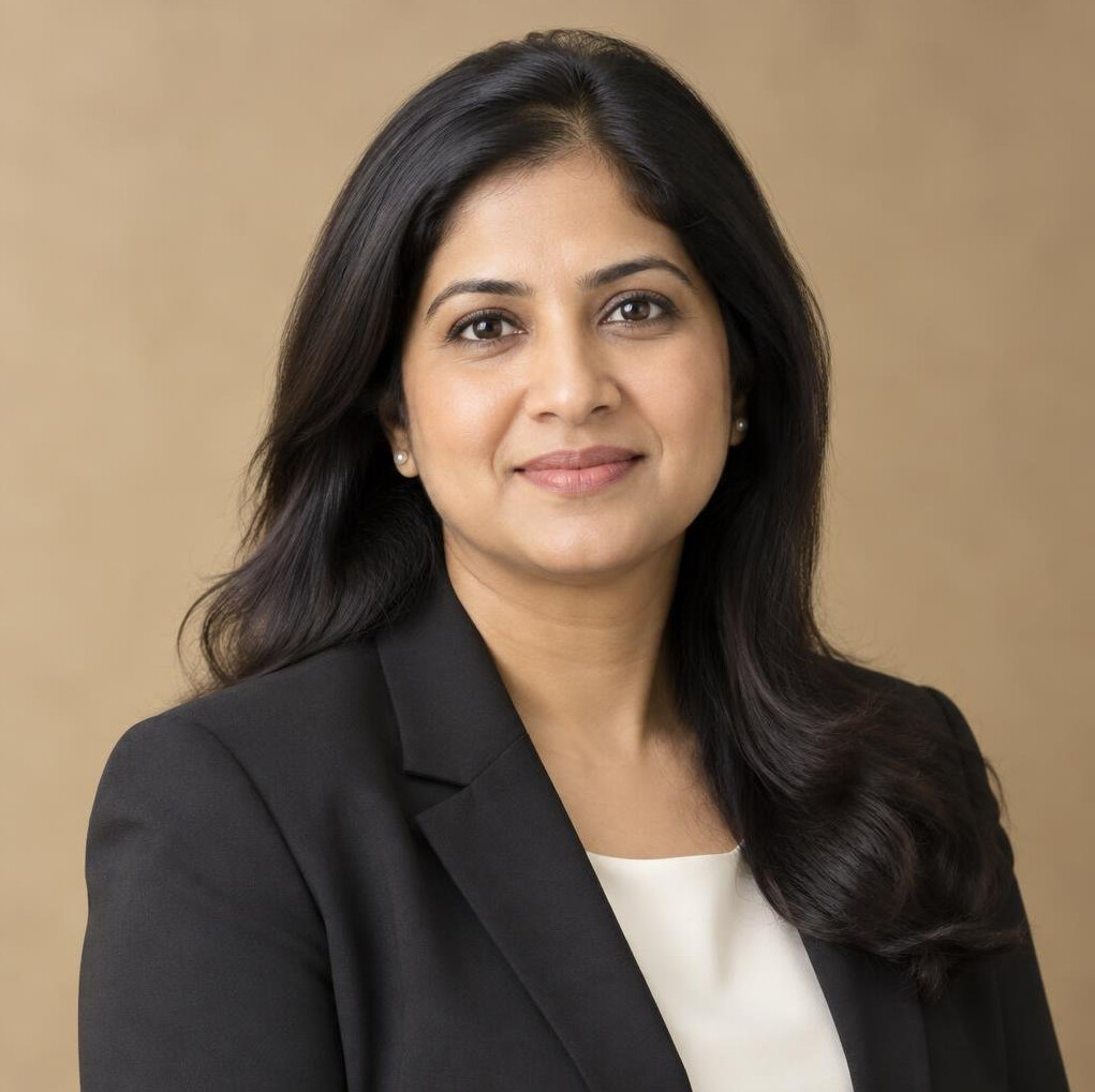 Studio portrait of a South Asian woman in smart professional attire